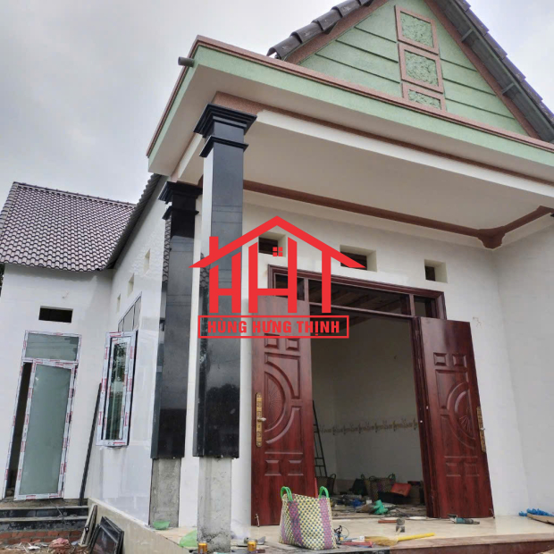 Thi Công Cửa Chính Bằng Thép Vân Gỗ